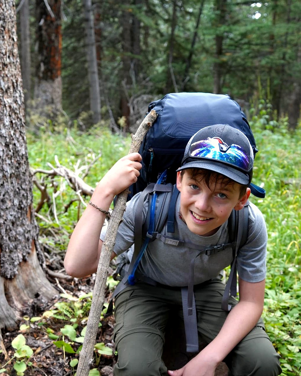 Kids exploring a creek during a Heart-J Center youth program