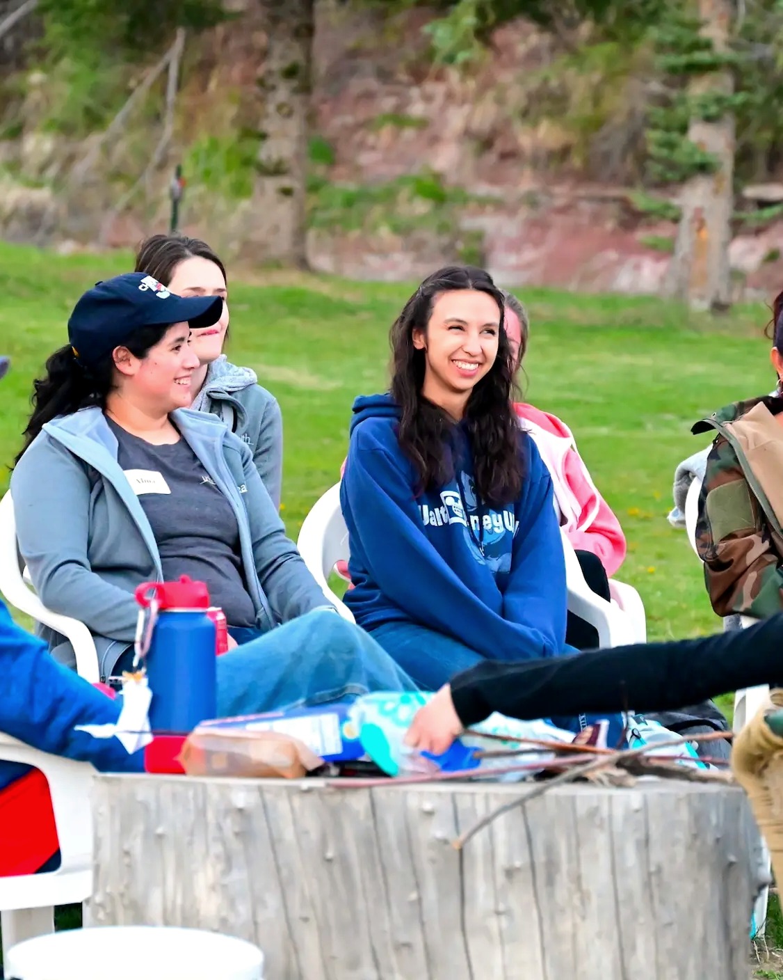 A participant in an ELEVATE nature-based mental health session with a horse